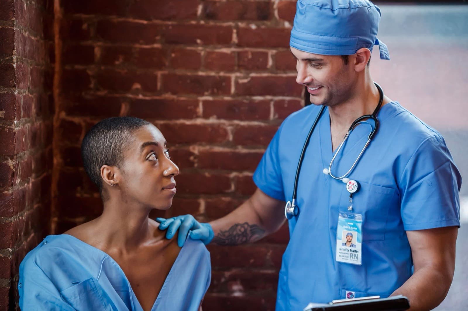 A nurse sharing a warm, caring moment with a patient